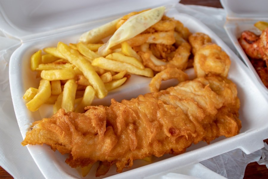 Hand-battered cod fillets with fries